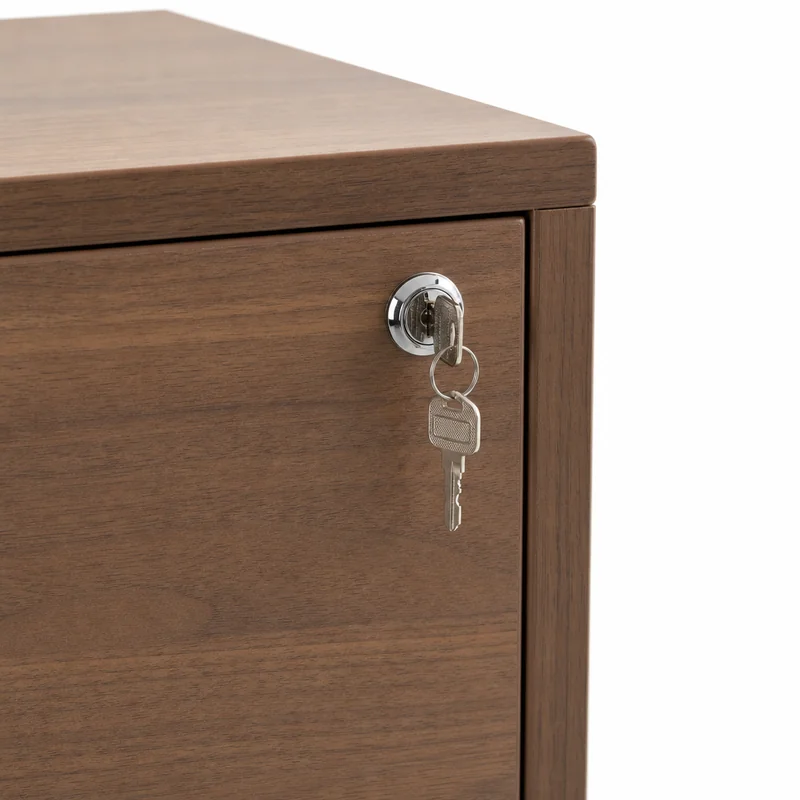 cam lock for cupboard with key on a wooden drawer