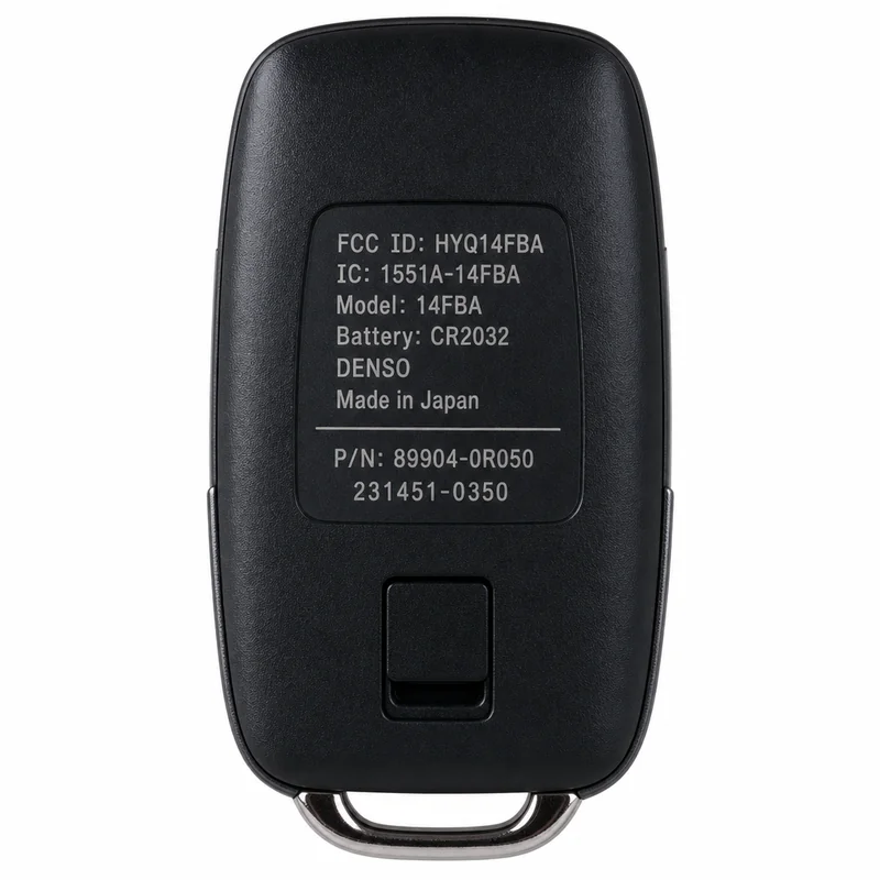 back of a car key fob showing FCC ID and part number