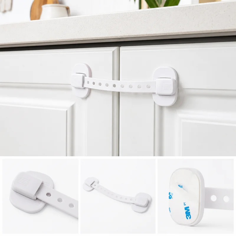 child-safety strap lock on a kitchen cabinet door